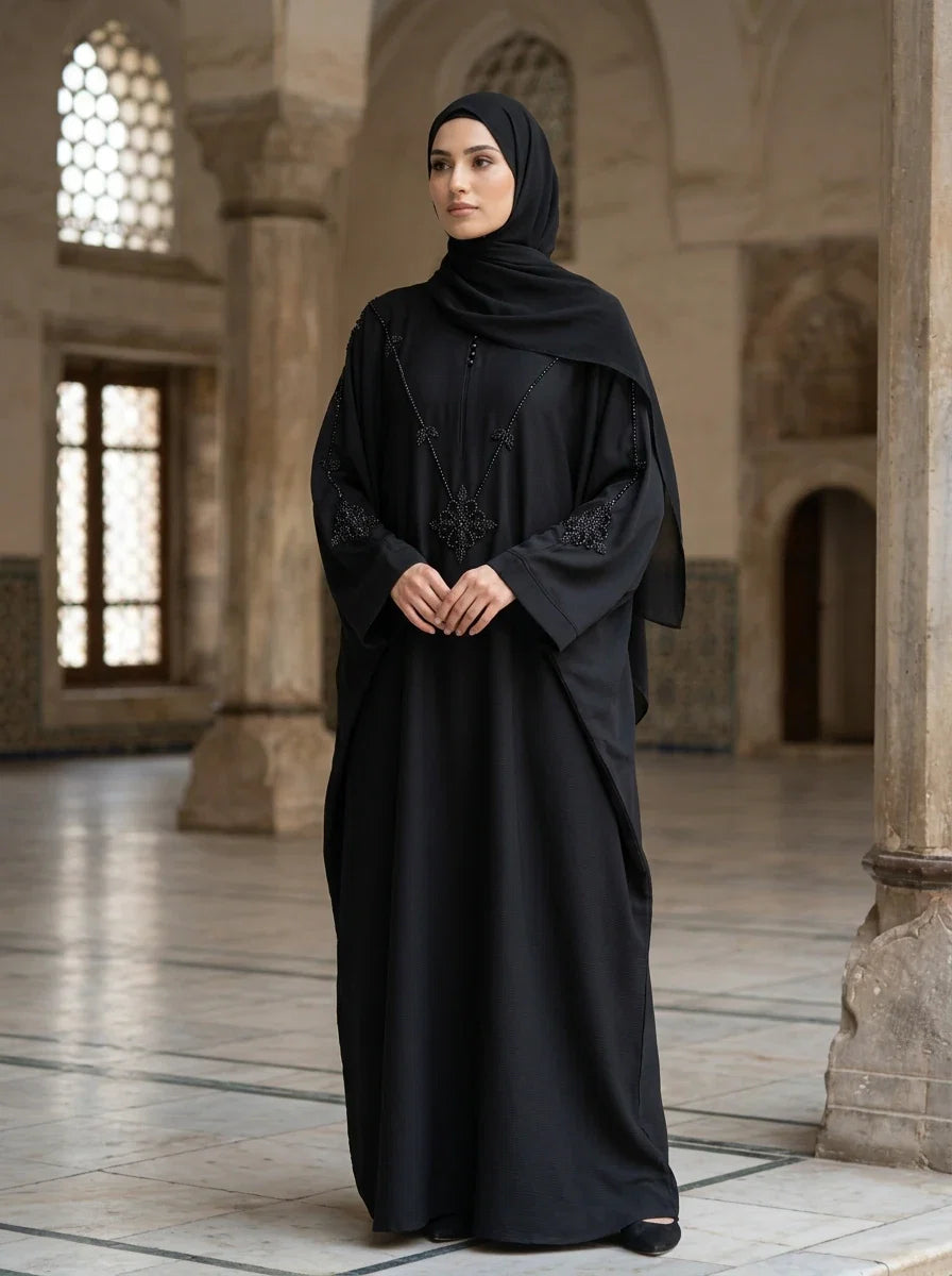 FashionSense Tehreem Handwork Abaya in Black — beaded medallion kaftan, front view
