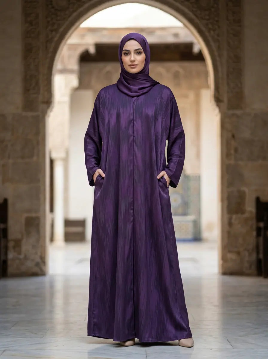 FashionSense Aaliyah Abaya in Plum — closed-front pleated abaya with V-neck, fabric-covered buttons and kimono sleeves