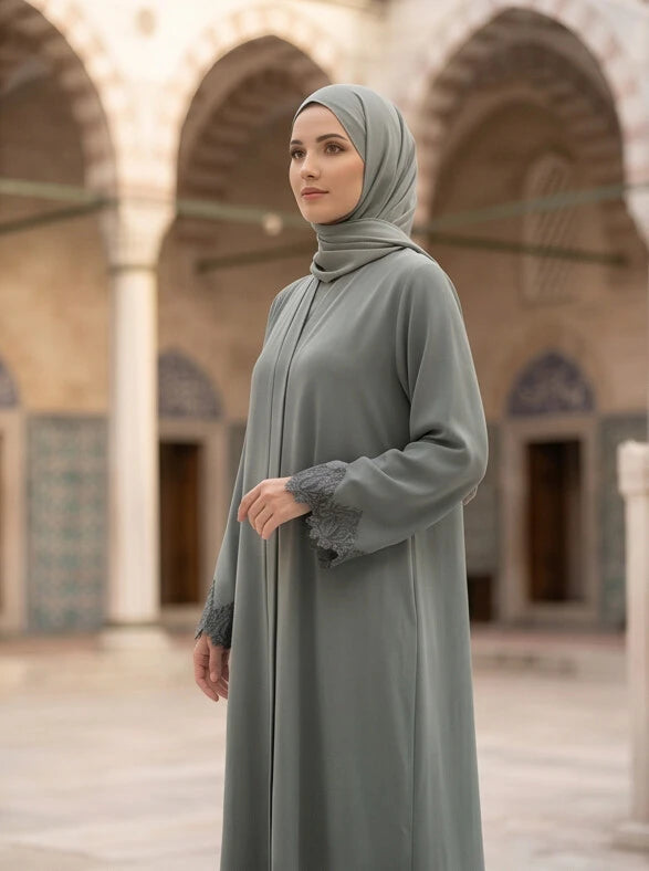 Ayra Abaya - model wearing full length abaya, side view
