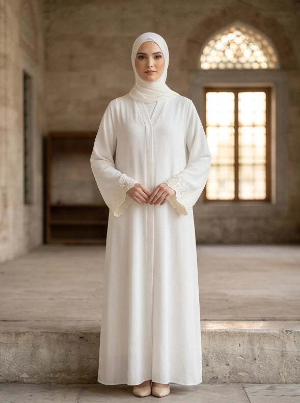 Hoor Abaya - model wearing full length abaya, side view