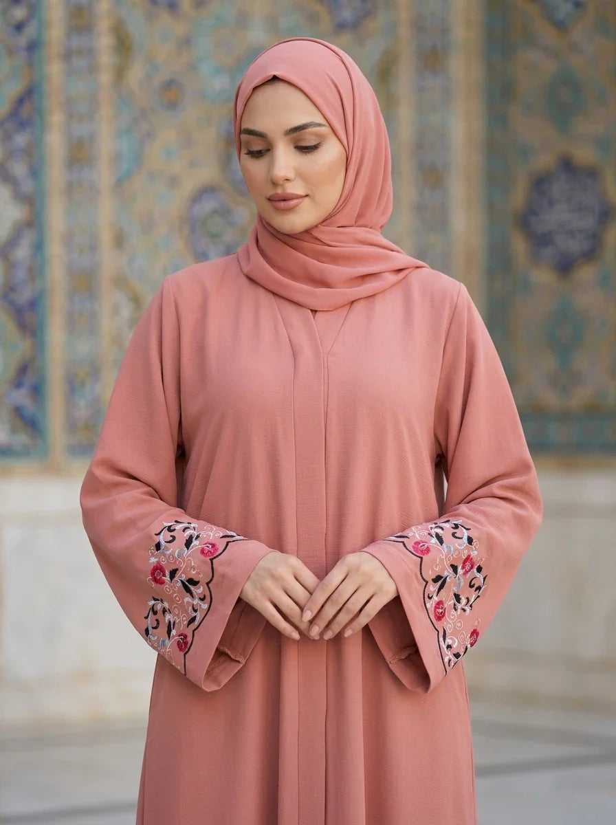 Arwa Abaya in salmon pink, model wearing full length view