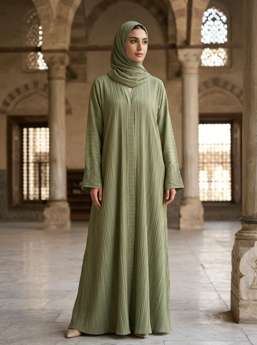 Iqra Abaya in Pistachio Green, pleated texture with embroidered cuffs