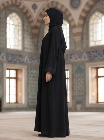 Sunaina Abaya - model wearing full length abaya, side view