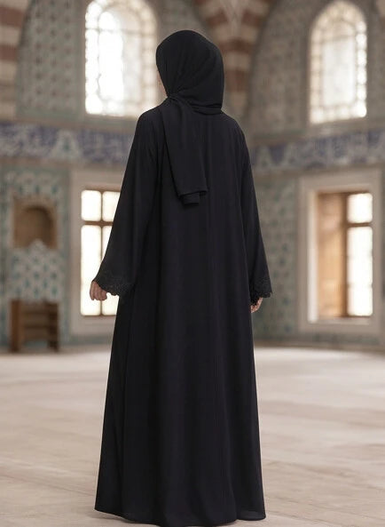 Sunaina Abaya - model wearing abaya, styled with hijab