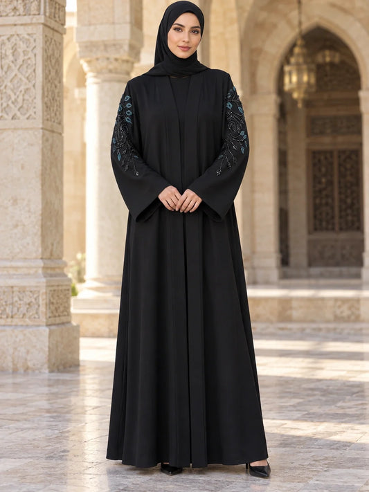 Uzma Abaya in Black with teal and gold floral sleeves