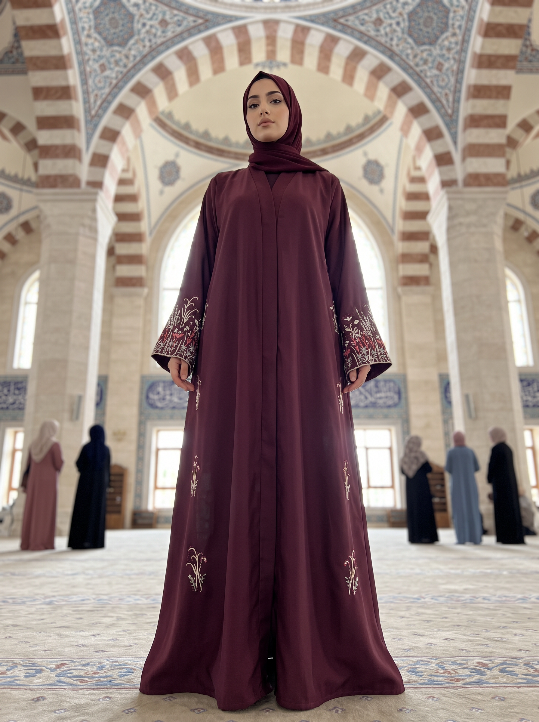 Noor burgundy abaya, low-angle full-length