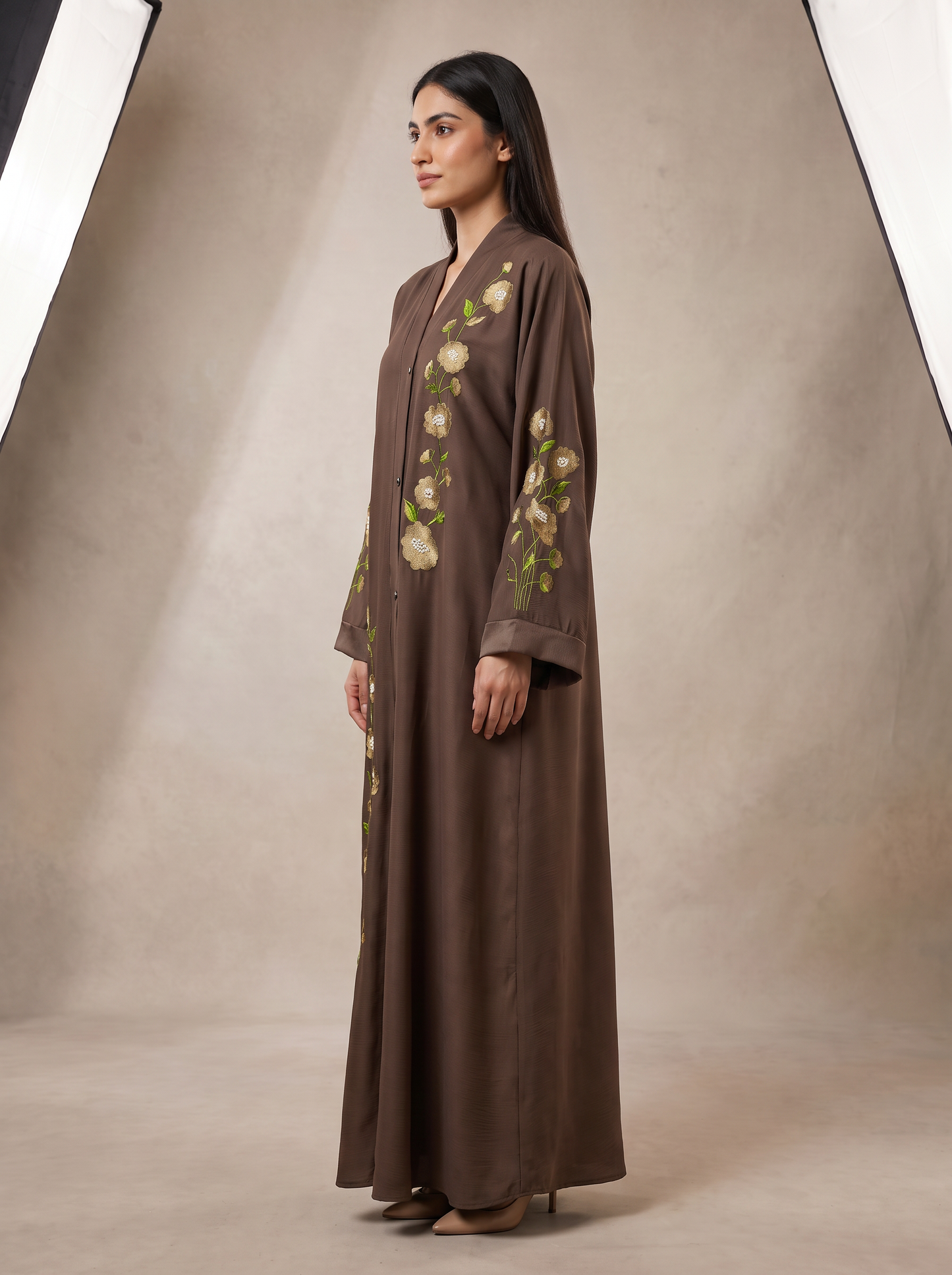 Hiba brown abaya side profile view highlighting floor-length drape and front-open cut