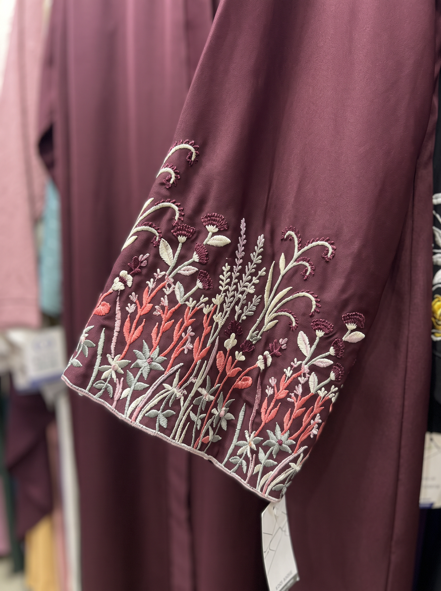 Noor burgundy abaya, sleeve embroidery detail