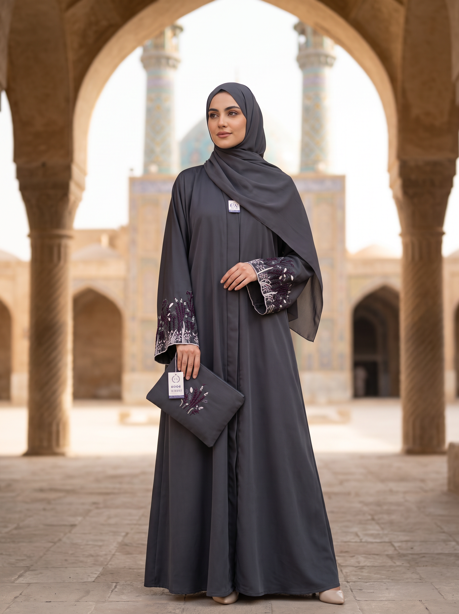 Layla charcoal grey abaya, mosque courtyard full-length