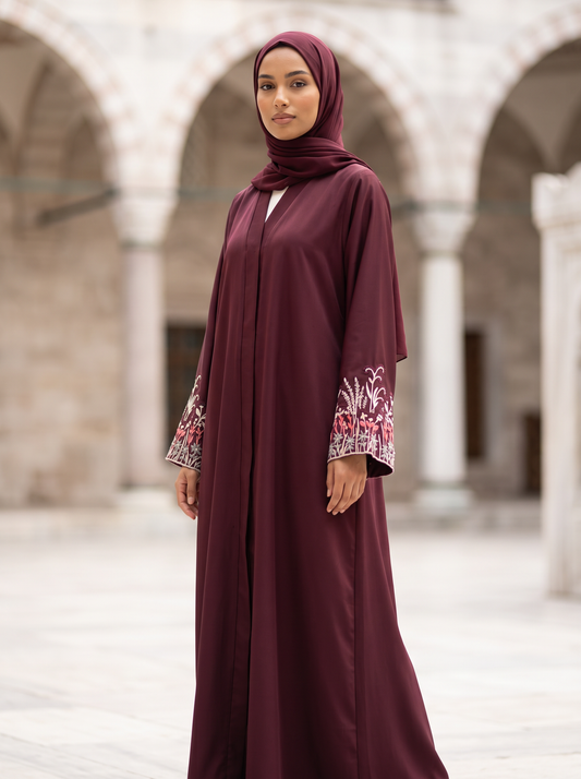 Noor burgundy abaya, three-quarter angle