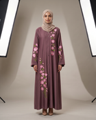 Zainab Embroidered Abaya in mauve Nida fabric, front view on model with pink floral hand embroidery