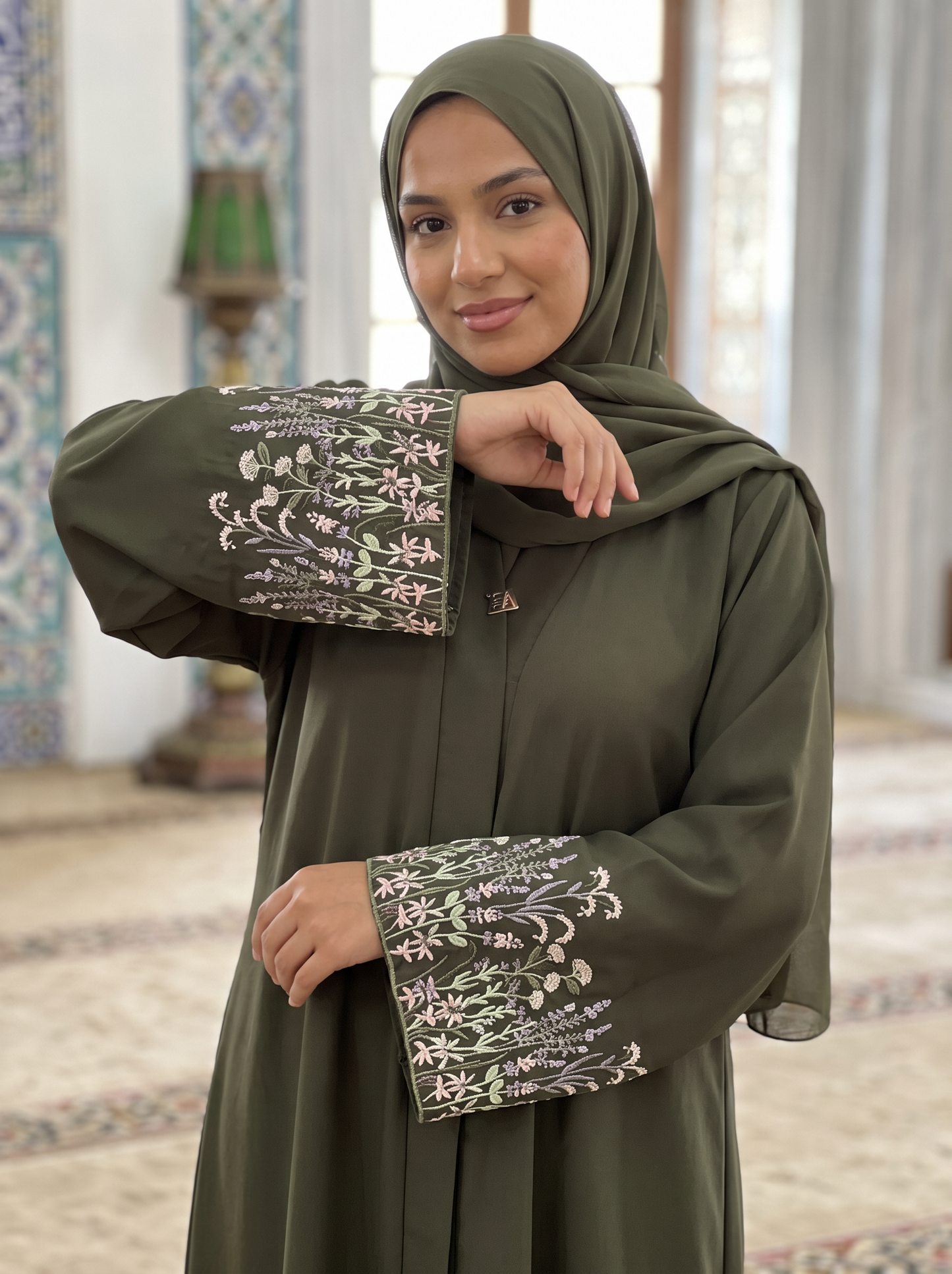 Yasmin olive green abaya, medium close-up of sleeve embroidery