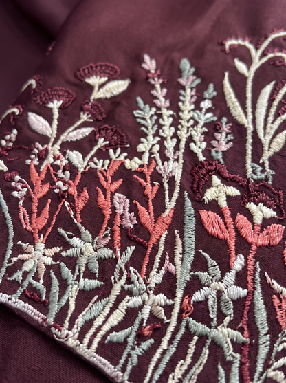 Noor burgundy abaya, macro sleeve embroidery detail